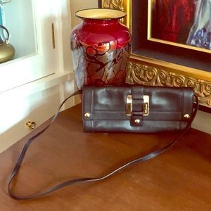Anne Klein black leather clutch